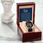 Luxury men's openwork watch in mahogany gift box with personalized message from mom and dad.