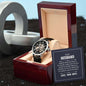 Men's openwork watch with black leather strap in luxury mahogany box, showcasing elegant skeleton dial, perfect gift for husband.