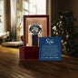 Openwork watch with skeleton dial and genuine leather strap displayed in a mahogany-style box with a sentimental note for son.