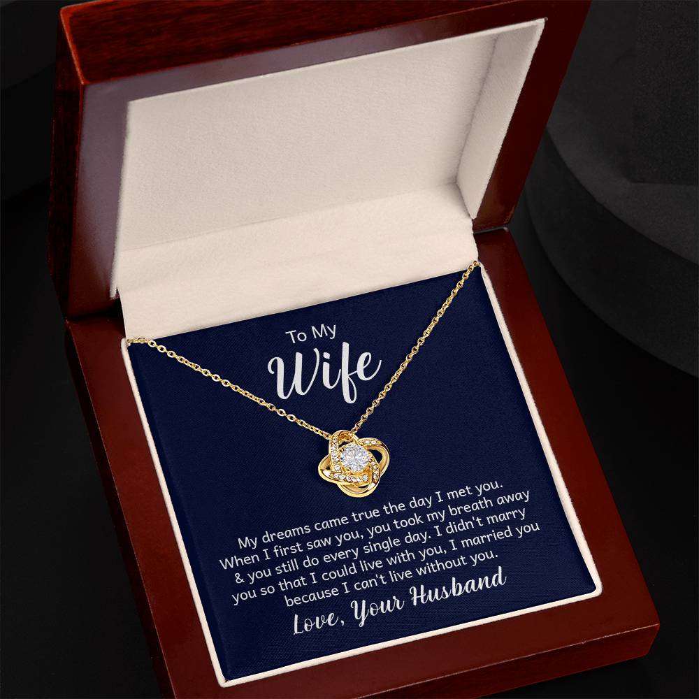 Love Knot Necklace in gift box with message for wife from husband, featuring cubic zirconia pendant in 18k gold setting.