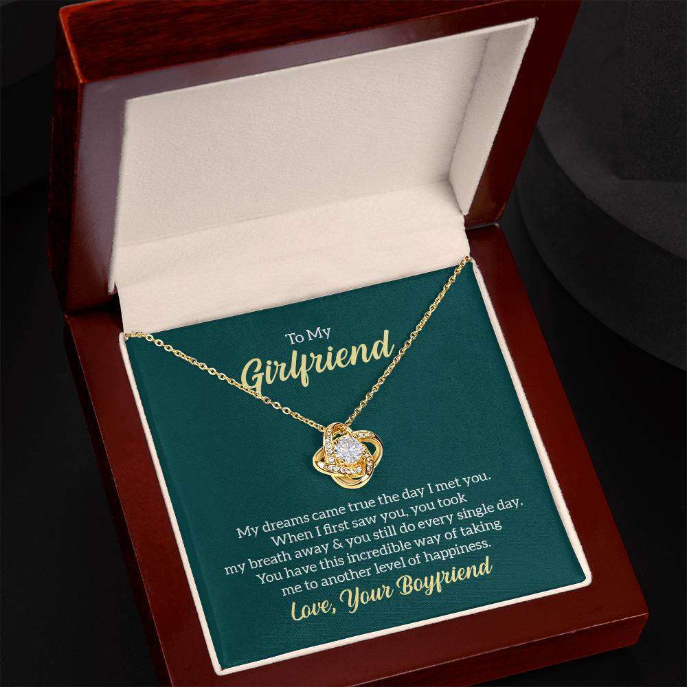Love Knot Necklace for Girlfriend in luxury box with LED spotlight, featuring cubic zirconia and adjustable chain.
