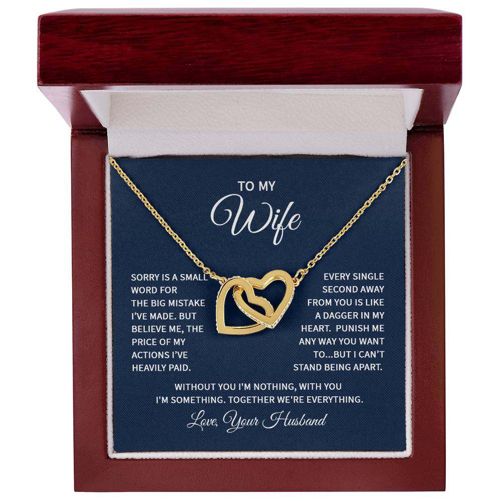 Interlocking hearts necklace for wife, featuring CZ crystals and gold finish, in gift box with sentimental message.