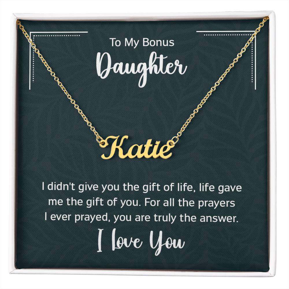 Customised name necklace on a dark background card for daughter, featuring a cursive pendant and heartfelt message.