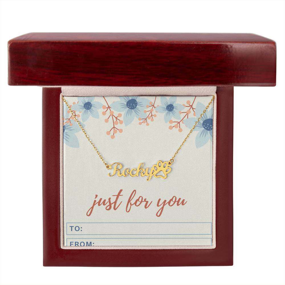 Personalized name necklace with paw print charm in a luxury gift box, perfect for pet lovers.