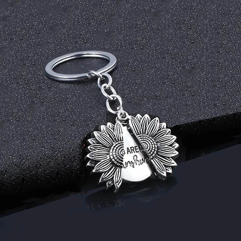 Sunflower with hidden message necklace showcasing artistic design and secret inscription.