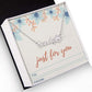 Personalized name necklace with paw print charm, stainless steel, adjustable chain, gift box included.