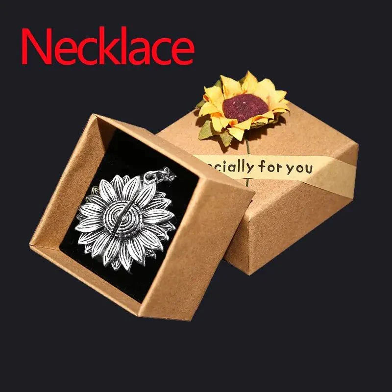 Sunflower Hidden Message Necklace in gift box, symbolizes positivity and loyalty.