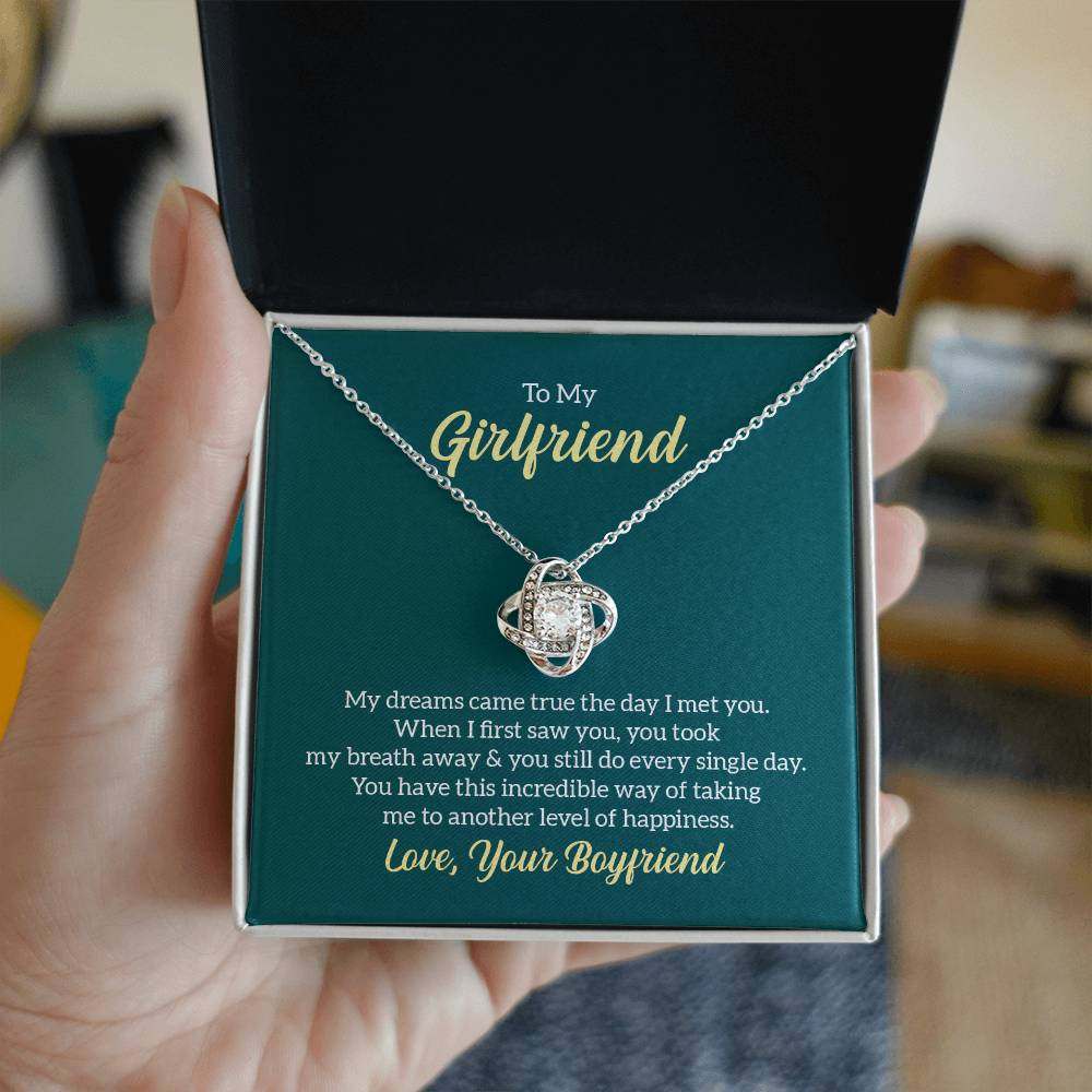 Love Knot Necklace for Girlfriend in gift box with heartfelt message, featuring cubic zirconia and adjustable chain.