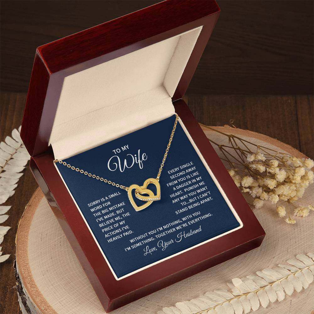 Interlocking hearts necklace for wife from husband in luxury box with message.