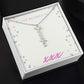 Vertical personalized name necklace in a gift box, customizable cursive design on adjustable cable chain.