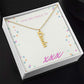 Personalized gold name necklace in gift box with adjustable chain.