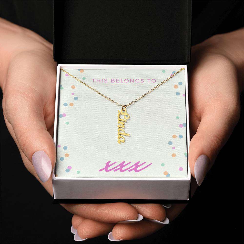 Vertical personalized name necklace in gift box with cursive design.