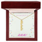 Personalized name necklace in a mahogany style luxury gift box with LED spotlight.