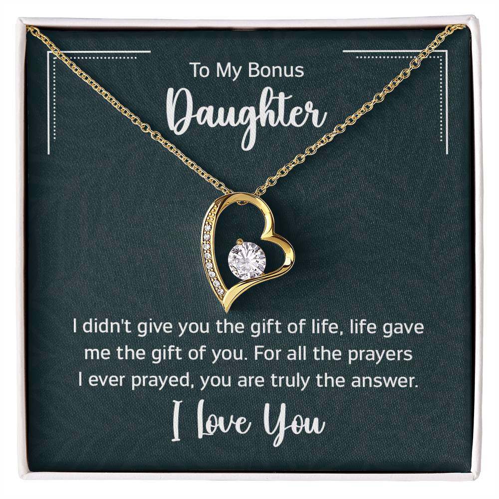 Gold heart pendant necklace with cubic zirconia for bonus daughter.