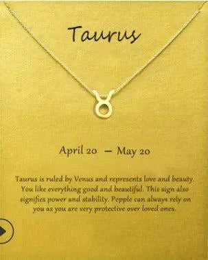 Taurus constellation zodiac sign pendant necklace on a gold card background.