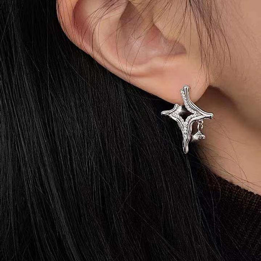 Asterism Rhinestone Earrings with geometric metal design and sparkling rhinestones.