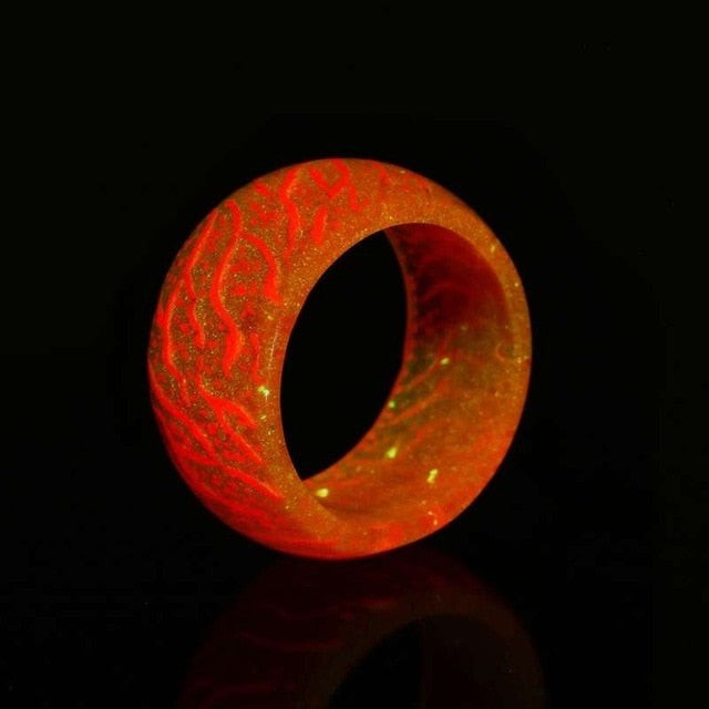  Love Glow Ring in vibrant orange color made of non-toxic translucent resin.